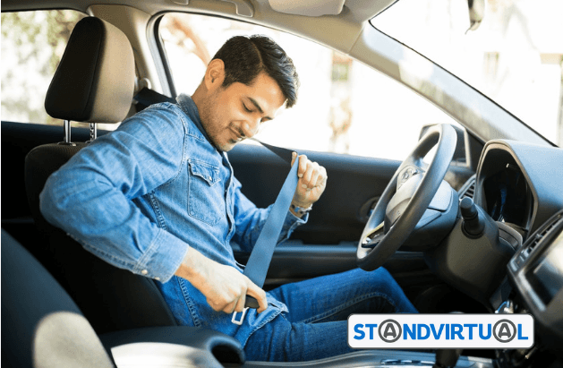 homem a colocar o cinto de segurança homem a colocar o cinto de segurança