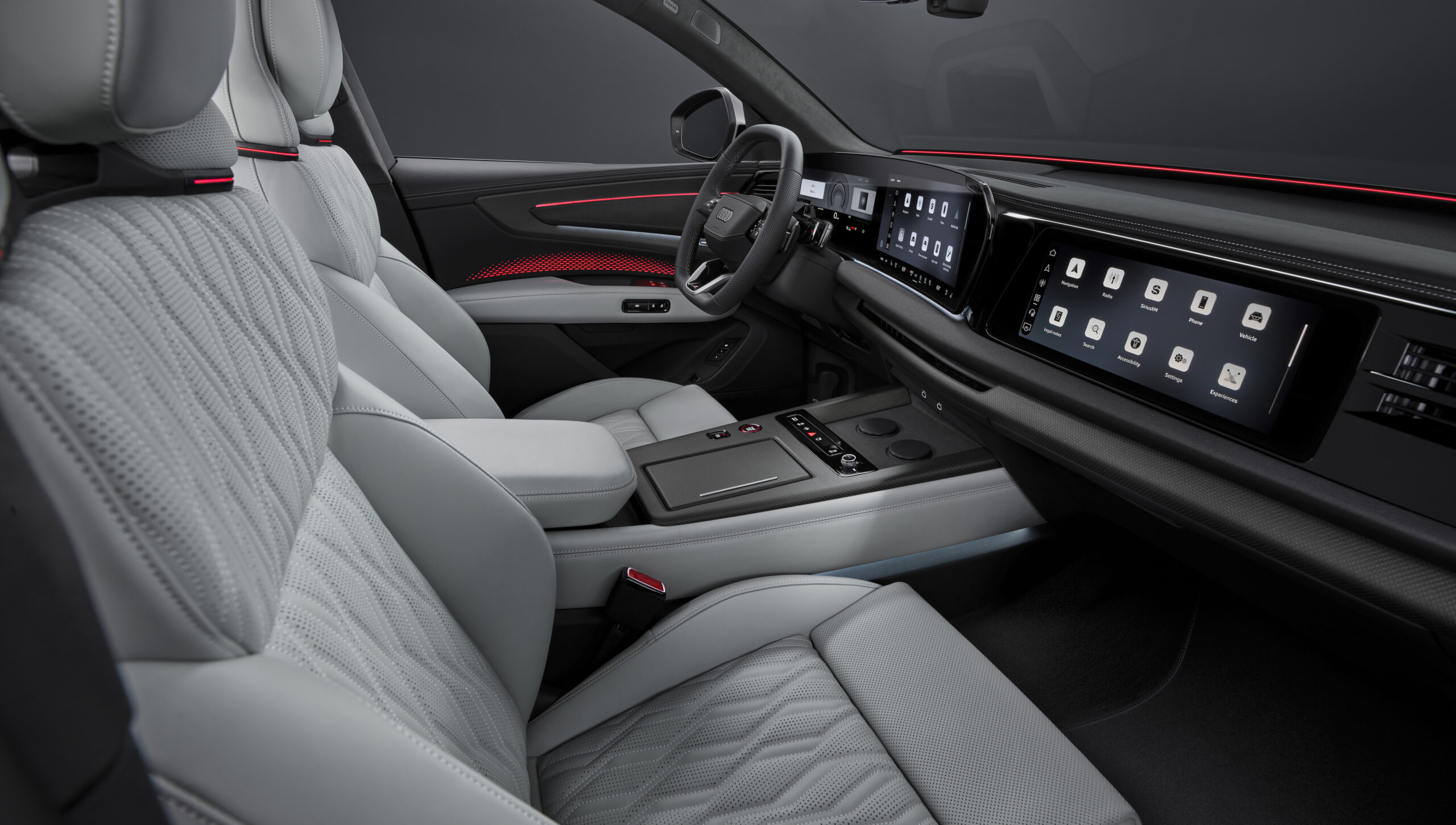 Habitáculo do Audi Q9 com bancos em pele e foco no conforto dos passageiros traseiros
